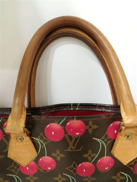 louis vuitton cherry purse history.